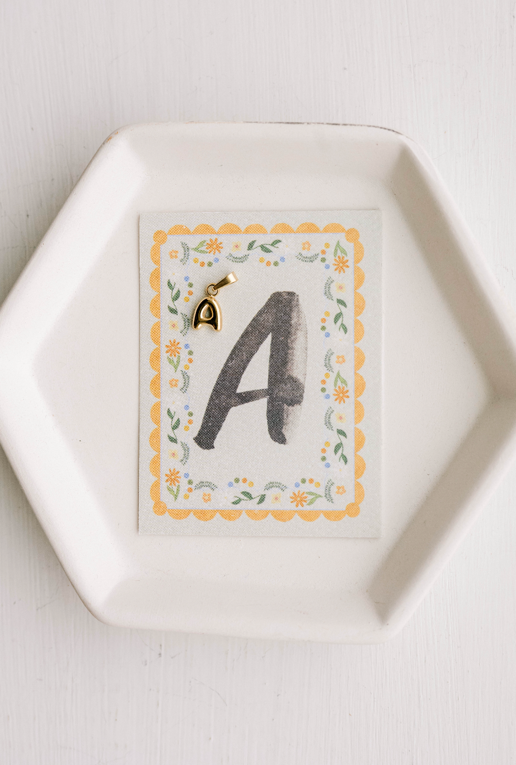 A - Letter Charm